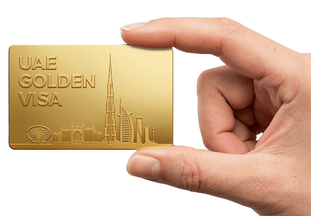UAE Golden Visa card held over Dubai skyline